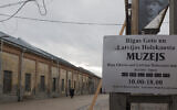A man stands inside the Riga Ghetto Museum in Riga, Latvia, January 11, 2014. (Fishman/Ullstein via Getty Images via JTA)