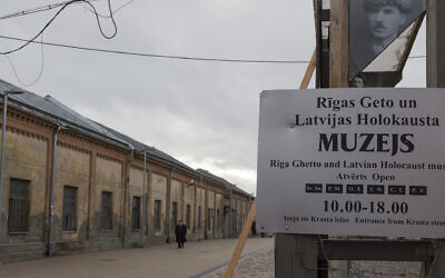 A man stands inside the Riga Ghetto Museum in Riga, Latvia, January 11, 2014. (Fishman/Ullstein via Getty Images via JTA)