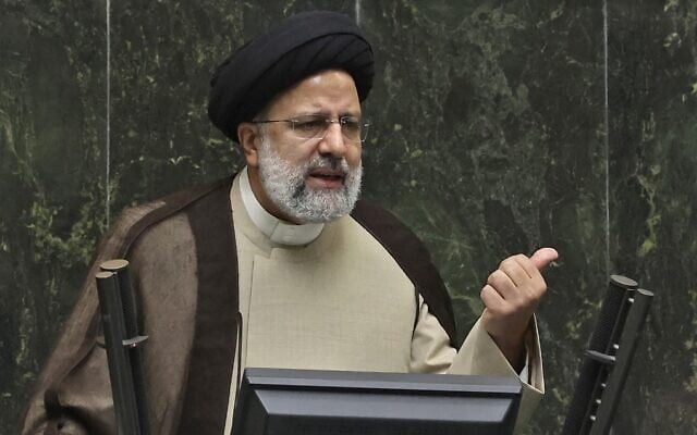 Iranian President Ebrahim Raisi addresses the parliament in Tehran on November 16, 2021. (Atta Kenare/AFP)