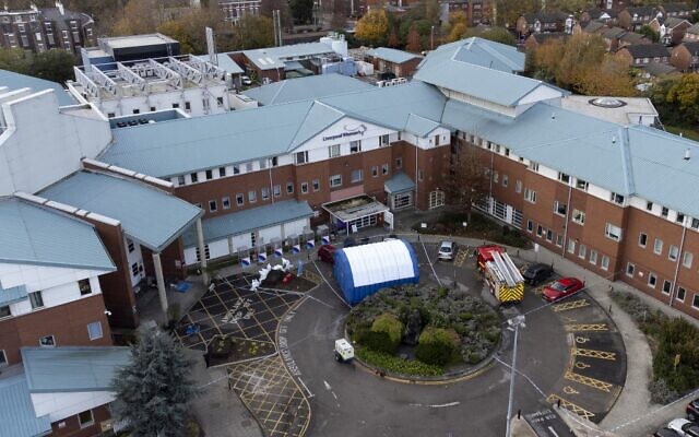 An aerial view shows a Police forensic tent outside of Liverpool Women's Hospital in Liverpool, on November 16, 2021, two days after a car blast. (Oli Scarff/AFP)