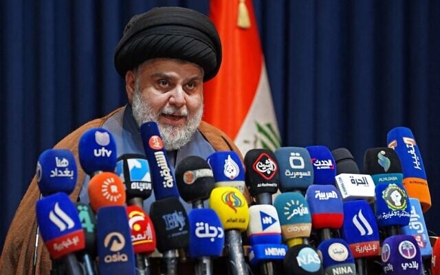 Iraqi Shiite cleric Muqatada al-Sadr speaks at a news conference in the central holy shrine city of Najaf, on November 18, 2021. (Ali Najafi/AFP) Iraqi Shiite cleric Muqatada al-Sadr speaks at a news conference in the central holy shrine city of Najaf, on November 18, 2021. (Ali Najafi/AFP)