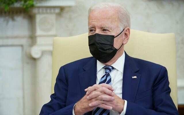 US President Joe Biden looks on during a bilateral meeting with Canada's Prime Minister Justin Trudeau in the Oval Office of the White House in Washington, on November 18, 2021. (Mandel Ngan/AFP) US President Joe Biden looks on during a bilateral meeting with Canada's Prime Minister Justin Trudeau in the Oval Office of the White House in Washington, on November 18, 2021. (Mandel Ngan/AFP)