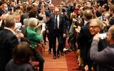 French far-right media pundit Eric Zemmour (center) arrives at the ILEC Conference Centre in west London, on November 19, 2021, to attend an evening with members of London's French community. (Tolga Akmen/AFP)