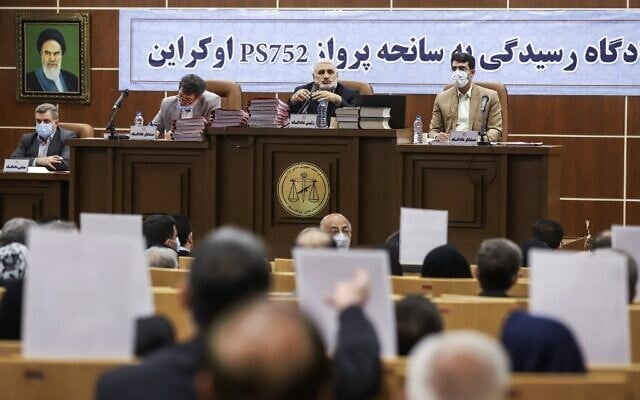 A picture obtained from the Iranian Mizan News agency shows a view of the opening hearing in the military trial for the Ukraine International Airlines flight PS752 that was shot down in January 2020 near the capital, that began in Tehran on November 21, 2021. (MIZAN NEWS / AFP) A picture obtained from the Iranian Mizan News agency shows a view of the opening hearing in the military trial for the Ukraine International Airlines flight PS752 that was shot down in January 2020 near the capital, that began in Tehran on November 21, 2021. (MIZAN NEWS / AFP)