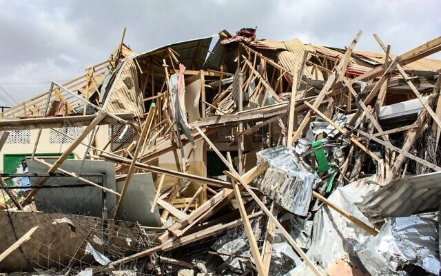 Destroyed building of Mocaasir primary and secondary school is seen at a bomb explosion site in Mogadishu, Somalia, on November 25, 2021. (AFP) Destroyed building of Mocaasir primary and secondary school is seen at a bomb explosion site in Mogadishu, Somalia, on November 25, 2021. (AFP)