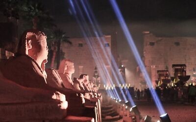 This picture taken on November 25, 2021 shows a view of the human-headed sphinxes along the 2700-meter-long 'Rams Road' leading from the Temple of Luxor (background) to the Karnak Temple (unseen) further north, in Egypt's southern city of the same name (Khaled DESOUKI / AFP)