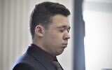 Kyle Rittenhouse closes his eyes and cries as he is found not guilty on all counts at the Kenosha County Courthouse on November 19, 2021, in Kenosha, Wisconsin. (Sean Krajacic/Pool/Getty Images/AFP)
