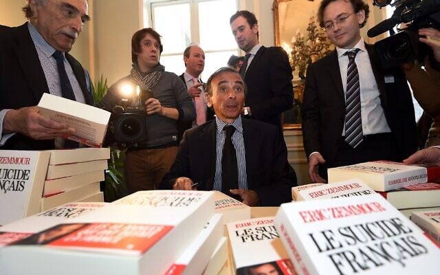 Eric Zemmour signs copies of his book "The French Suicide" at the Cercle de Lorraine-Club Van Lotharingen in Brussels, Belgium, January 6, 2015. (Emmanuel Dunand/AFP) Eric Zemmour signs copies of his book "The French Suicide" at the Cercle de Lorraine-Club Van Lotharingen in Brussels, Belgium, January 6, 2015. (Emmanuel Dunand/AFP)