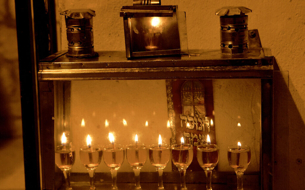 A Hanukkah menorah in Israel glows with the light of olive oil, not candles. (Dana Friedlander for the Israeli Ministry of Tourism) A Hanukkah menorah in Israel glows with the light of olive oil, not candles. (Dana Friedlander for the Israeli Ministry of Tourism)