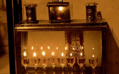 A Hanukkah menorah in Israel glows with the light of olive oil, not candles. (Dana Friedlander for the Israeli Ministry of Tourism)
