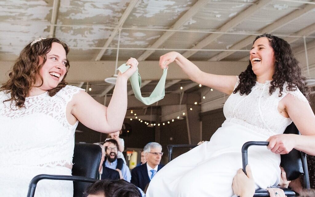 Rabbis Becca Walker (left) and Ariella Rosen became the first same-sex rabbinical couple to be married in the Conservative movement. (Kelly Prizel Photography via JTA) Rabbis Becca Walker (left) and Ariella Rosen became the first same-sex rabbinical couple to be married in the Conservative movement. (Kelly Prizel Photography via JTA)