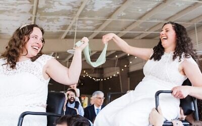 Rabbis Becca Walker (left) and Ariella Rosen became the first same-sex rabbinical couple to be married in the Conservative movement. (Kelly Prizel Photography via JTA)