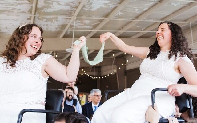 Rabbis Becca Walker (left) and Ariella Rosen became the first same-sex rabbinical couple to be married in the Conservative movement. (Kelly Prizel Photography via JTA)