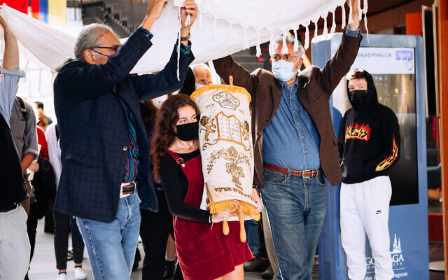 Jewish students and faculty at Gonzaga University in Spokane, Washington, celebrated the October 1 inauguration of a 'Jewish Sacred Space' at the school, along with the arrival of its first-ever Torah. (Chiana McInelly/ via JTA)