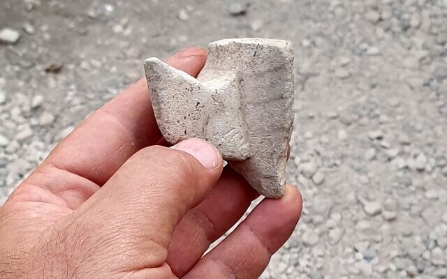 One of the measuring cup fragments found in Yavne. (Pablo Betzer/Israel Antiquities Authority) One of the measuring cup fragments found in Yavne. (Pablo Betzer/Israel Antiquities Authority)