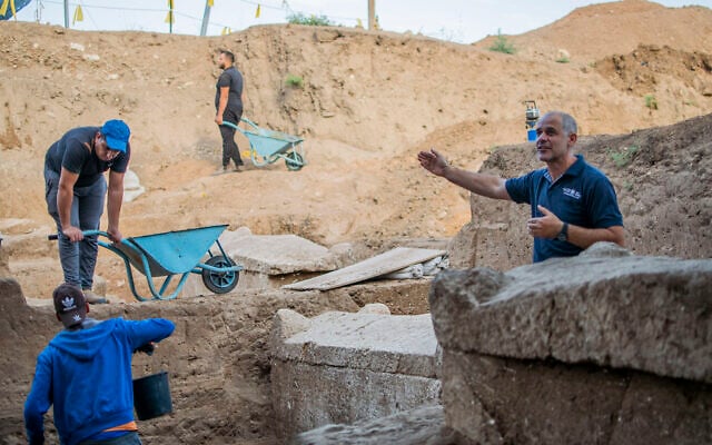 Excavation director Pablo Betzer beside a sarcophagus from the Sanhedrin era in Yavne. (
Yoli Schwartz/Israel Antiquities Authority) Excavation director Pablo Betzer beside a sarcophagus from the Sanhedrin era in Yavne. (
Yoli Schwartz/Israel Antiquities Authority)
