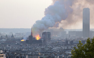 In this file photo dated April 15, 2019, Notre Dame cathedral is burning in Paris (AP Photo/Rafael Yaghobzadeh, FILE)
