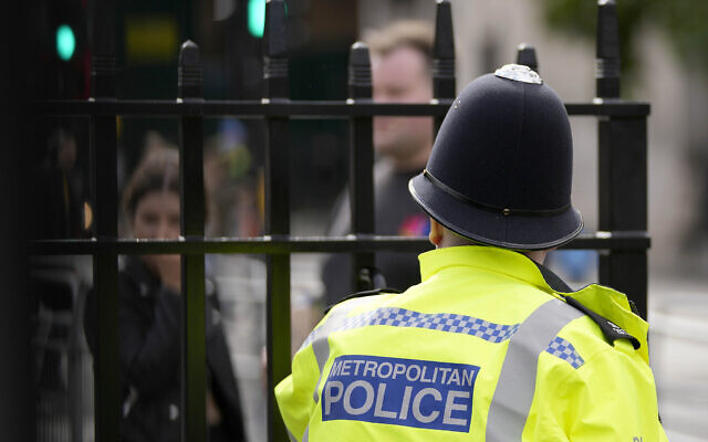 Illustrative: A Metropolitan police officer on patrol, in London, October 1, 2021. (Frank Augstein/AP) Illustrative: A Metropolitan police officer on patrol, in London, October 1, 2021. (Frank Augstein/AP)