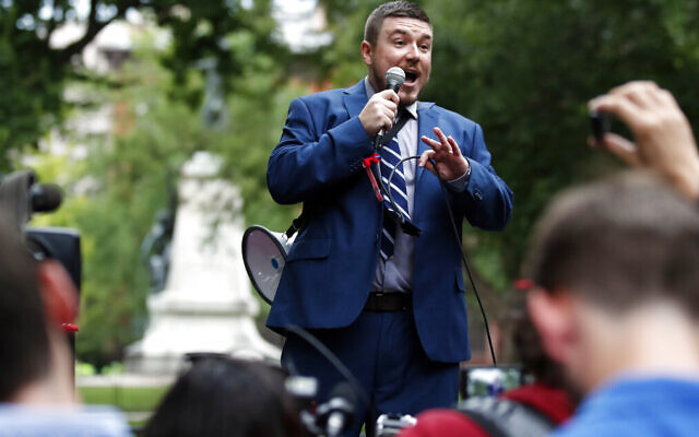 In this photo from August 12, 2018, white nationalist Jason Kessler speaks at a rally near the White House on the one year anniversary of the Charlottesville "Unite the Right" rally in Washington.(AP Photo/Alex Brandon, FILE) In this photo from August 12, 2018, white nationalist Jason Kessler speaks at a rally near the White House on the one year anniversary of the Charlottesville "Unite the Right" rally in Washington.(AP Photo/Alex Brandon, FILE)