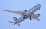 Illustrative -- An American Airlines aircraft approaches Philadelphia International Airport, Oct. 22, 2021. (AP Photo/Matt Rourke)