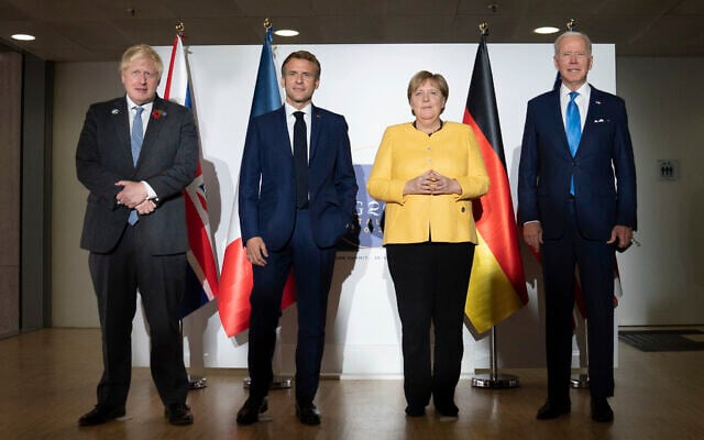 From left: British Prime Minister Boris Johnson, French President Emmanuel Macron, German Chancellor Angela Merkel and U.S. President Joe Biden at the G20 summit in Rome, October 30, 2021. (Stefan Rousseau/Pool via AP) From left: British Prime Minister Boris Johnson, French President Emmanuel Macron, German Chancellor Angela Merkel and U.S. President Joe Biden at the G20 summit in Rome, October 30, 2021. (Stefan Rousseau/Pool via AP)