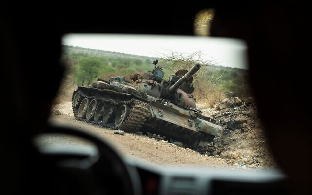 A destroyed tank is seen by the side of the road south of Humera in western Tigray, then annexed by the Amhara region, in Ethiopia, on May 1, 2021. (AP Photo/Ben Curtis, File) A destroyed tank is seen by the side of the road south of Humera in western Tigray, then annexed by the Amhara region, in Ethiopia, on May 1, 2021. (AP Photo/Ben Curtis, File)