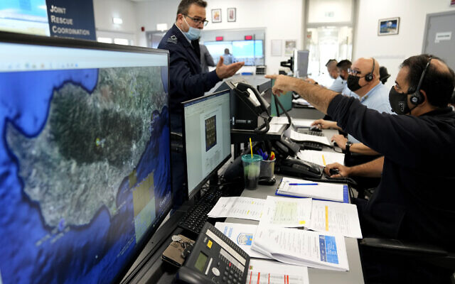 Officials observe Cypriot forces conducting rescue and counter-terrorism drills streamed live to monitors at the Joint Rescue Coordination Center during the 'Nemesis' exercise in the southern coastal city of Larnaca, Cyprus, November 3, 2021. (/Petros Karadjias/AP) Officials observe Cypriot forces conducting rescue and counter-terrorism drills streamed live to monitors at the Joint Rescue Coordination Center during the 'Nemesis' exercise in the southern coastal city of Larnaca, Cyprus, November 3, 2021. (/Petros Karadjias/AP)