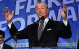 New Jersey Governor Phil Murphy delivers a victory speech after defeating Republican Jack Ciattarelli to win re-election, on November 3, 2021, in Asbury Park, New Jersey. (AP Photo/Noah K. Murray)