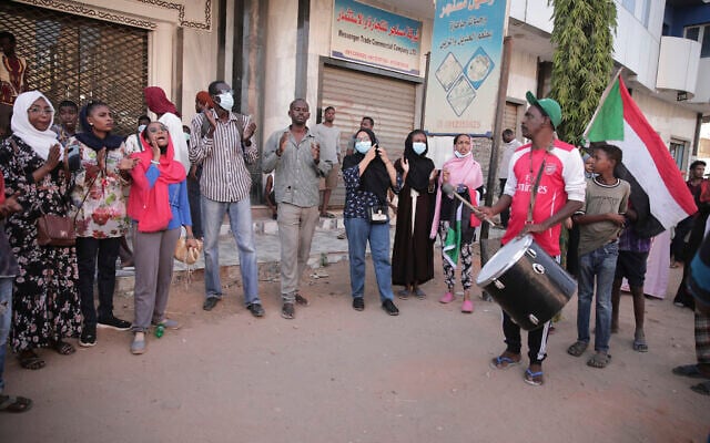 People chant slogans during a protest in Khartoum, amid ongoing demonstrations against a military takeover in Khartoum, Sudan, Thursday, Nov. 4, 2021. (AP Photo/Marwan Ali) People chant slogans during a protest in Khartoum, amid ongoing demonstrations against a military takeover in Khartoum, Sudan, Thursday, Nov. 4, 2021. (AP Photo/Marwan Ali)