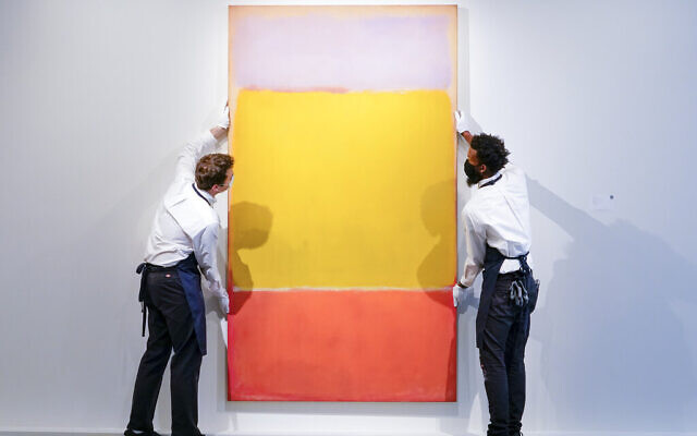 Art handlers adjust Mark Rothko's 'No. 7' on display at Sotheby's auction house during a press preview for the upcoming The Macklowe Collection auction, Nov. 5, 2021, in New York. (AP Photo/Mary Altaffer) Art handlers adjust Mark Rothko's 'No. 7' on display at Sotheby's auction house during a press preview for the upcoming The Macklowe Collection auction, Nov. 5, 2021, in New York. (AP Photo/Mary Altaffer)