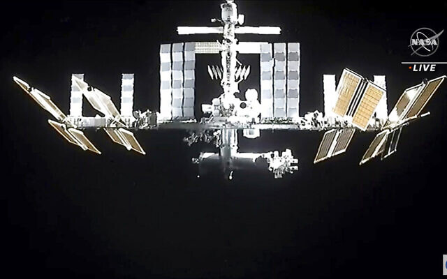 In this image from video provided by NASA, the International Space Station is seen as astronauts in the SpaceX Dragon capsule undock on November 8, 2021. (NASA via AP) In this image from video provided by NASA, the International Space Station is seen as astronauts in the SpaceX Dragon capsule undock on November 8, 2021. (NASA via AP)