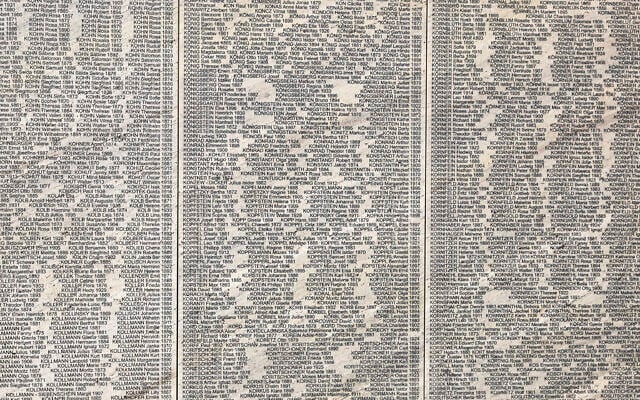 The Shoah Wall of Names Memorial carries the name of every Austrian Jew who fell victim to the NS regime in the 'Ostarrichipark' in Vienna, Austria, Nov. 9, 2021 (AP Photo/Lisa Leutner)