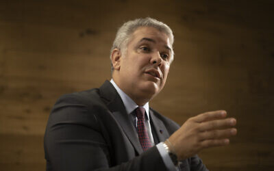Colombia's President Ivan Duque Marquez speaks to The Associated Press in Tel Aviv, Israel, November 9, 2021. (Ariel Schalit/AP)
