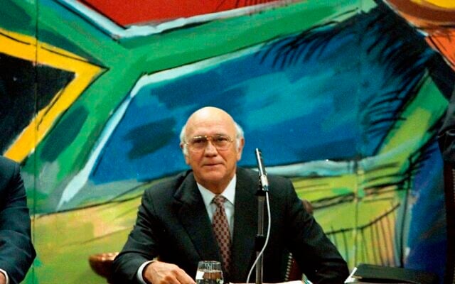 Former president and leader of the National Party F. W. de Klerk, discusses his resignation, below a mural of the new South African flag, at a National Party Caucus meeting in Cape Town, August 26 1997. (AP Photo / Sasa Kralj, file) Former president and leader of the National Party F. W. de Klerk, discusses his resignation, below a mural of the new South African flag, at a National Party Caucus meeting in Cape Town, August 26 1997. (AP Photo / Sasa Kralj, file)