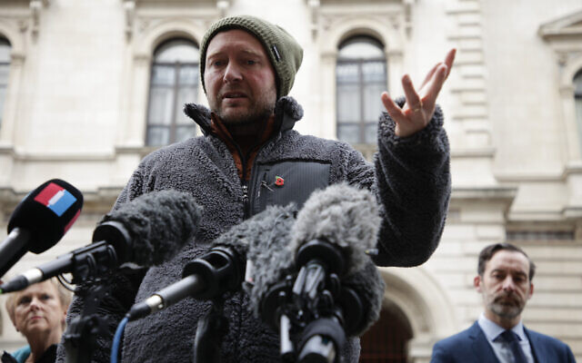 Richard Ratcliffe, husband of detained charity worker Nazanin Zaghari-Ratcliffe, talks to the media following a meeting at the Foreign, Commonwealth and Development Office in London, Thursday, Nov. 11, 2021. (AP Photo/David Cliff)