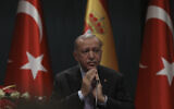 Turkey's President Recep Tayyip Erdogan speaks at a press conference at the presidential palace, in Ankara, Turkey, Nov. 17, 2021. (Burhan Ozbilici/AP)