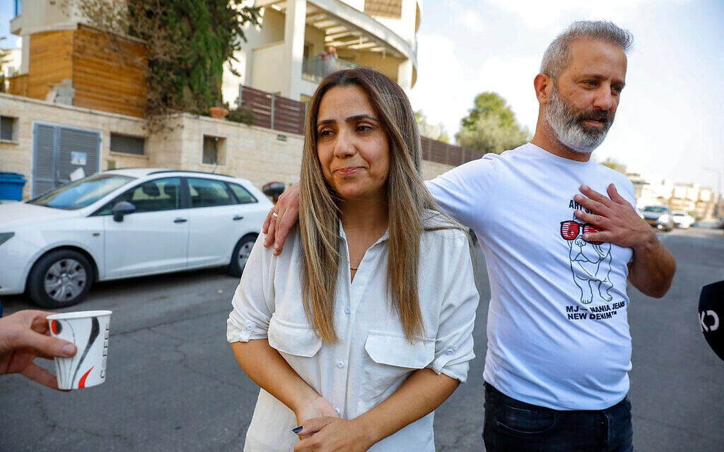 Natali and Mordy Oknin, who were held in Turkey for a week on suspicion of espionage, speak to journalists hours after they were released at their home in Modiin, on November 18, 2021. (AP Photo/Ariel Schalit) Natali and Mordy Oknin, who were held in Turkey for a week on suspicion of espionage, speak to journalists hours after they were released at their home in Modiin, on November 18, 2021. (AP Photo/Ariel Schalit)