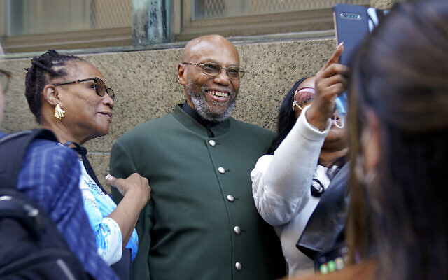 Muhammad Aziz (center) poses for photos outside the courthouse with members of his family after his conviction in the killing of Malcolm X was vacated, on November 18, 2021, in New York. (AP Photo/Seth Wenig) Muhammad Aziz (center) poses for photos outside the courthouse with members of his family after his conviction in the killing of Malcolm X was vacated, on November 18, 2021, in New York. (AP Photo/Seth Wenig)