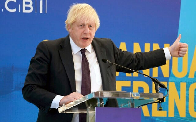 UK Prime Minister Boris Johnson speaks during the CBI (Confederation of British Industry) annual conference, at the Port of Tyne, in South Shields, England, on November 22, 2021. (Owen Humphreys/Pool Photo via AP) UK Prime Minister Boris Johnson speaks during the CBI (Confederation of British Industry) annual conference, at the Port of Tyne, in South Shields, England, on November 22, 2021. (Owen Humphreys/Pool Photo via AP)