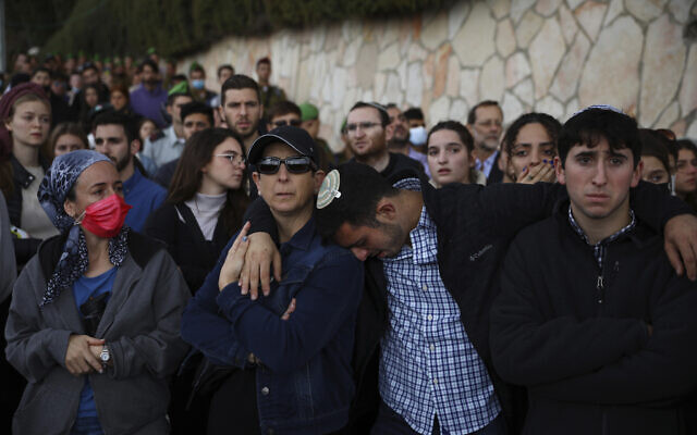 Mourners grieve at the funeral for Eliyahu Kay, a 26-year-old immigrant from South Africa, the day after he was killed when a Palestinian terrorist opened fire in the Old City of Jerusalem, Monday, Nov. 22, 2021. (AP Photo/Oded Balilty) Mourners grieve at the funeral for Eliyahu Kay, a 26-year-old immigrant from South Africa, the day after he was killed when a Palestinian terrorist opened fire in the Old City of Jerusalem, Monday, Nov. 22, 2021. (AP Photo/Oded Balilty)