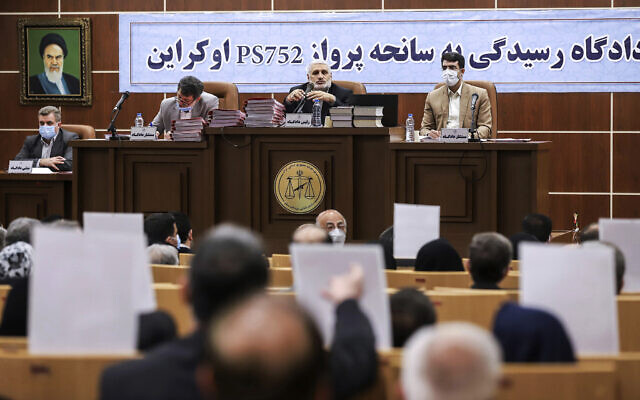 This photo released by Mizan News Agency, shows a hearing in an Iranian military courtroom for the 2020 downing of a Ukrainian plane that killed 176 people, Sunday, Nov. 21, 2021, in Tehran, Iran. (Koosha Mahshid Falahi/Mizan News Agency via AP) This photo released by Mizan News Agency, shows a hearing in an Iranian military courtroom for the 2020 downing of a Ukrainian plane that killed 176 people, Sunday, Nov. 21, 2021, in Tehran, Iran. (Koosha Mahshid Falahi/Mizan News Agency via AP)