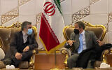 Director General of International Atomic Energy Agency, IAEA, Rafael Mariano Grossi, right, speaks with deputy head of the Atomic Energy Organization of Iran Behrouz Kamalvandi upon his arrival at Tehran's Imam Khomeini airport, Iran, Nov. 22, 2021. (Atomic Energy Organization of Iran via AP)