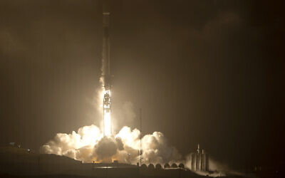 The SpaceX Falcon 9 rocket launches with the Double Asteroid Redirection Test, or DART, spacecraft onboard from Space Launch Complex 4E, at Vandenberg Space Force Base in California, November 23, 2021. (Bill Ingalls/NASA via AP)