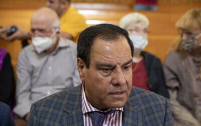 Palestinian Dr. Izzeldin Abuelaish sits in Israel's Supreme Court for a hearing on his demand for an apology from Israel over a 2009 tank strike that killed three of his daughters and a niece in the Gaza Strip, in Jerusalem, November 15, 2021. (AP Photo/Ariel Schalit, File)
