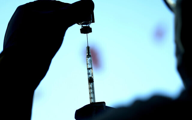 A dose of a Pfizer COVID-19 vaccine is prepared at Lurie Children's hospital, November 5, 2021, in Chicago. (AP Photo/Nam Y. Huh, File) A dose of a Pfizer COVID-19 vaccine is prepared at Lurie Children's hospital, November 5, 2021, in Chicago. (AP Photo/Nam Y. Huh, File)