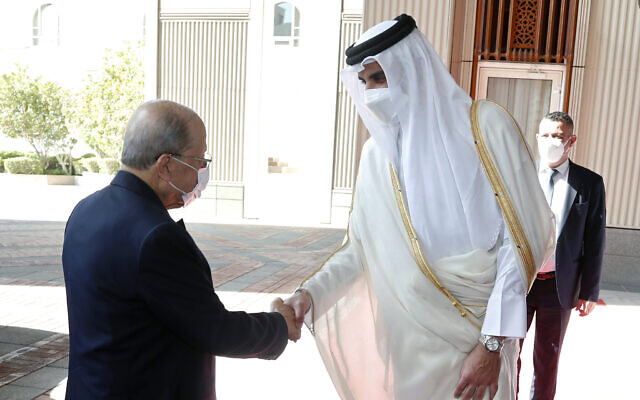 Qatar's Emir Sheikh Tamim bin Hamad Al Thani, right, shakes hand with Lebanese President Michel Aoun, in Doha, Qatar, Nov 29, 2021. (Dalati Nohra/Lebanese Official Government via AP) Qatar's Emir Sheikh Tamim bin Hamad Al Thani, right, shakes hand with Lebanese President Michel Aoun, in Doha, Qatar, Nov 29, 2021. (Dalati Nohra/Lebanese Official Government via AP)