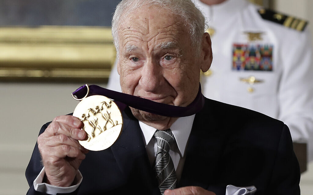 Actor, comedian and writer, Mel Brooks, holds up his 2015 National Medal of Arts awarded to him by President Barack Obama during a ceremony at the White House in Washington, DC, on September 22, 2016. (AP Photo/Carolyn Kaster, File) Actor, comedian and writer, Mel Brooks, holds up his 2015 National Medal of Arts awarded to him by President Barack Obama during a ceremony at the White House in Washington, DC, on September 22, 2016. (AP Photo/Carolyn Kaster, File)