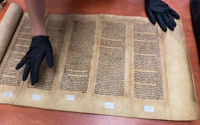 A stolen Torah scroll originally from Baghdad that was allegedly found with a Umm al-Fahm resident arrested by police, on November 17, 2021. (Israel Police) A stolen Torah scroll originally from Baghdad that was allegedly found with a Umm al-Fahm resident arrested by police, on November 17, 2021. (Israel Police)