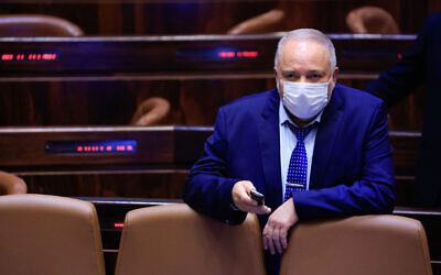 Illustrative: Finance Minister Avigdor Liberman during a first reading of the state budget at the assembly hall in the Knesset, September 2, 2021. (Olivier Fitoussi/Flash90)