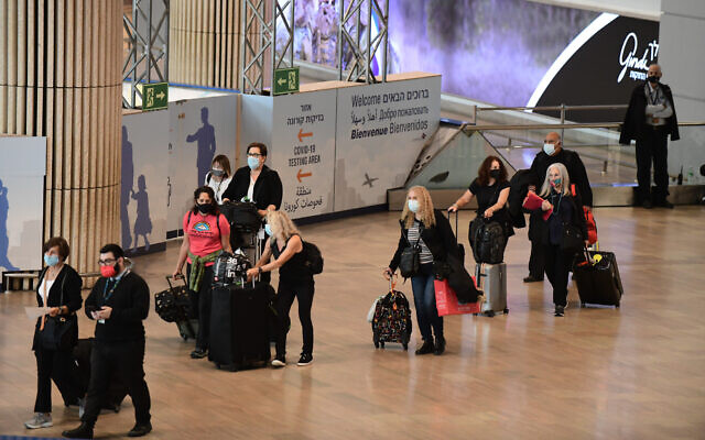 Arriving travelers at Ben Gurion Airport on November 1, 2021. (Tomer Neuberg/ Flash90) Arriving travelers at Ben Gurion Airport on November 1, 2021. (Tomer Neuberg/ Flash90)